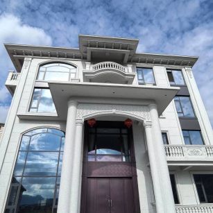 酒泉白麻别墅外墙干挂石材效果示例