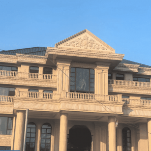 酒泉黄金麻别墅外墙干挂石材效果示例