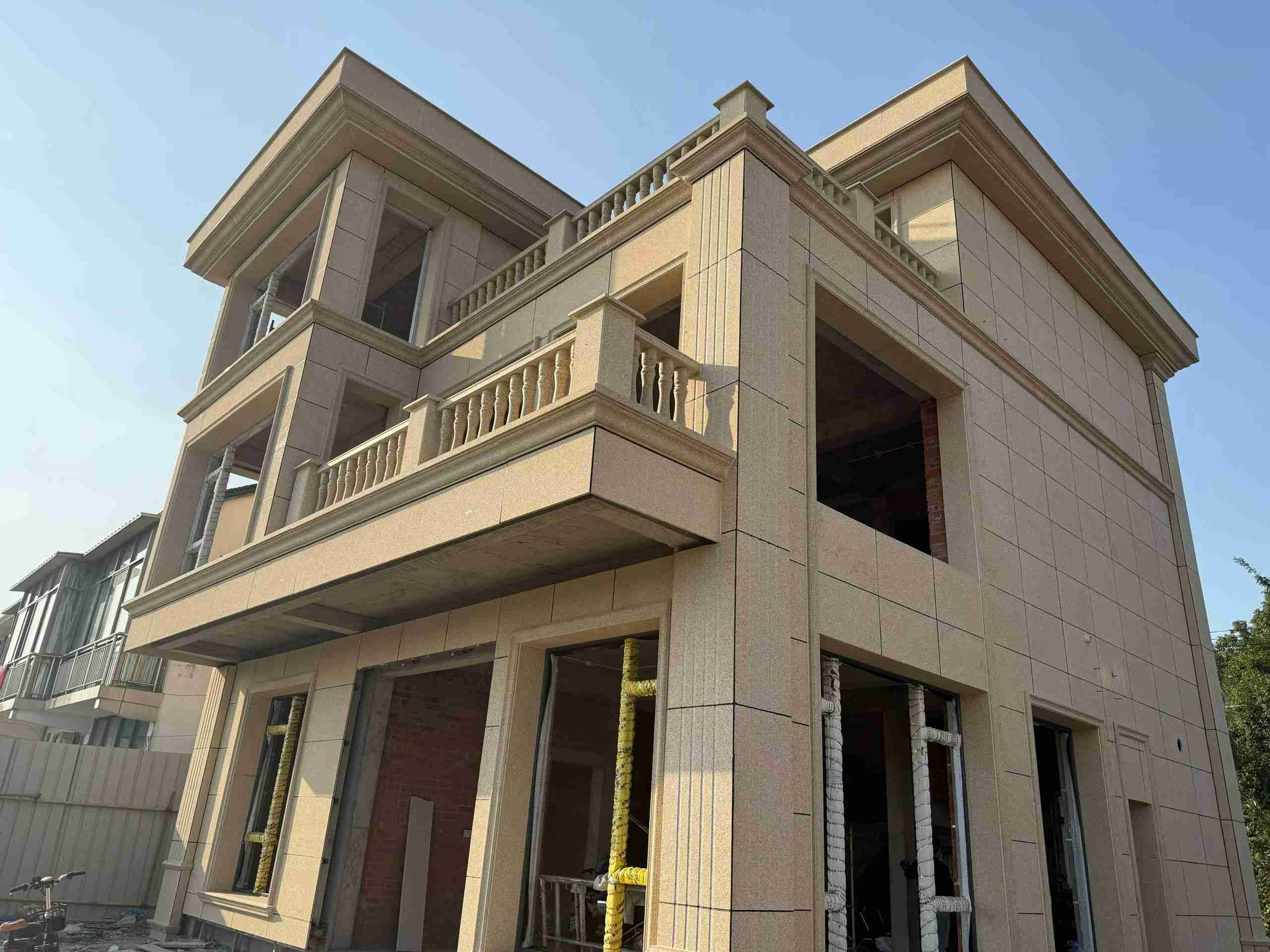 酒泉 黄金麻花岗岩石材荔枝面外墙干挂效果展示